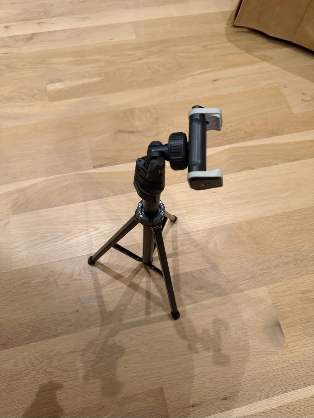 Compact Black Smartphone Tripod with Adjustable Phone Mount
